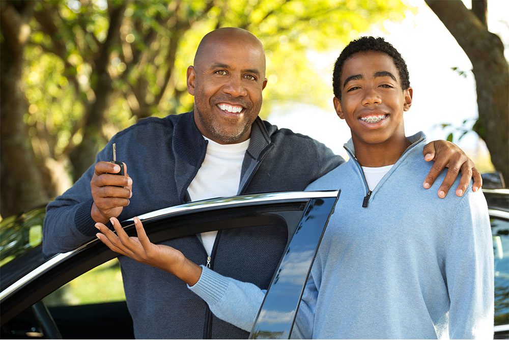 A-CNY-dad-passing-the-car-keys-to-his-newly-licensed-teen