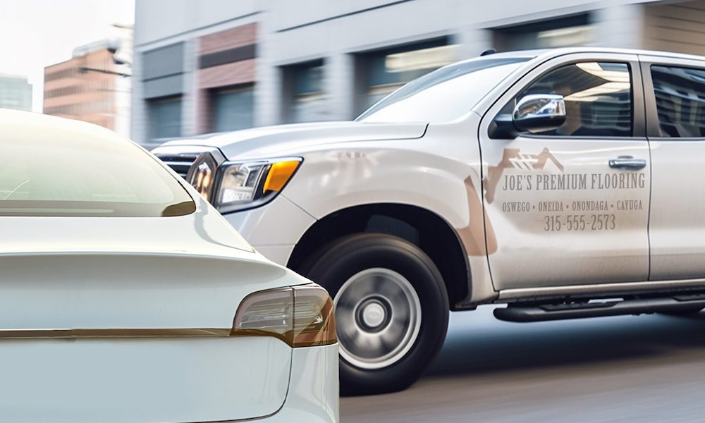 A small contractor with personal auto insurance narrowly misses a car at the intersection.